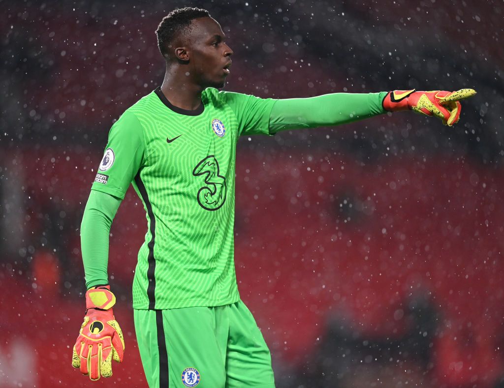 MANCHESTER, ENGLAND - OCTOBER 24: Edouard Mendy of Chelsea looks on during the Premier League match between Manchester United and Chelsea at Old Trafford on October 24, 2020 in Manchester, England. Sporting stadiums around the UK remain under strict restrictions due to the Coronavirus Pandemic as Government social distancing laws prohibit fans inside venues resulting in games being played behind closed doors. (Photo by Michael Regan/Getty Images)