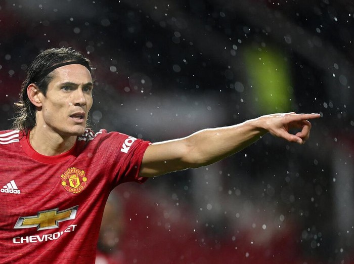 Manchester United's Edinson Cavani gestures during the English Premier League soccer match between Manchester United and Chelsea, at the Old Trafford stadium in Manchester, England, Saturday, Oct. 24, 2020. (Michael Regan/Pool via AP)