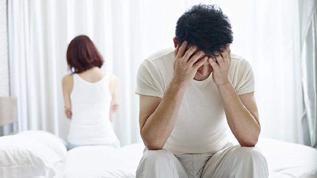 young asian couple with relationship problem appear depressed and frustrated.