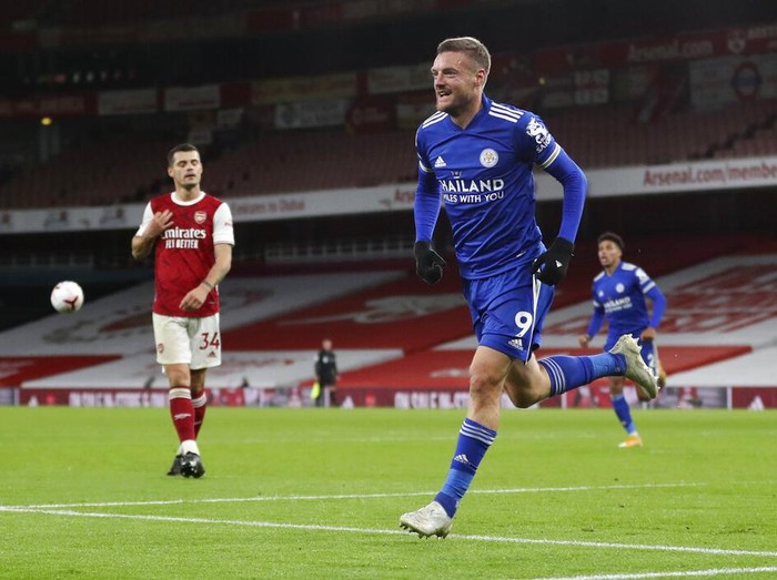 Leicesters Jamie Vardy celebrates after scoring his teams first goal during the English Premier League soccer match between Arsenal and Leicester City at Emirates Stadium in London, England, Sunday, Oct. 25, 2020. (Catherine Ivill/Pool via AP)