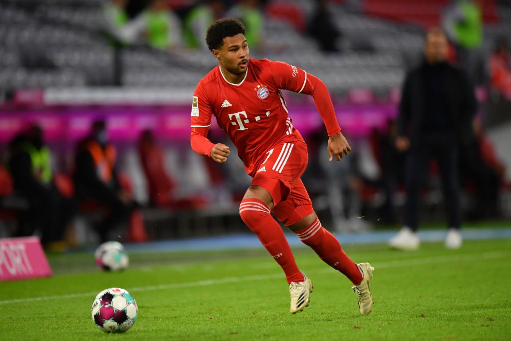 MUNICH, GERMANY - OCTOBER 04: Serge Gnabry of Bayern Muenchen plays the ball during the Bundesliga match between FC Bayern Muenchen and Hertha BSC at Allianz Arena on October 04, 2020 in Munich, Germany. (Photo by Sebastian Widmann/Getty Images)