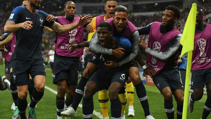 Paul Pogba MOSCOW, RUSSIA - JULY 15: Paul Pogba of France celebrates with team mates after scoring during the 2018 FIFA World Cup Russia Final between France and Croatia at Luzhniki Stadium on July 15, 2018 in Moscow, Russia. (Photo by Shaun Botterill/Getty Images)
