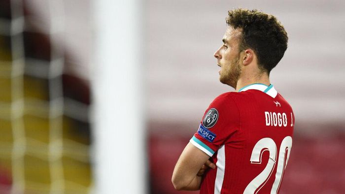 Diogo JOta Liverpools Diogo Jota reacts after scoring his sides first goal during the Champions League Group D soccer match between Liverpool and FC Midtjylland at Anfield stadium, in Liverpool, England, Tuesday, Oct. 27, 2020. (Peter Powell/Pool via AP)