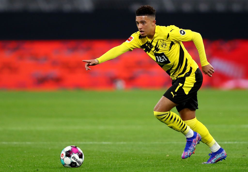 DORTMUND, GERMANY - OCTOBER 24: Jadon Sancho of Dortmund runs with the ball during the Bundesliga match between Borussia Dortmund and FC Schalke 04 at Signal Iduna Park on October 24, 2020 in Dortmund, Germany. A limited number of spectators (300) will be in attendance as Covid-19 pandemic restrictions are eased in Dortmund.  (Photo by Martin Rose/Getty Images)