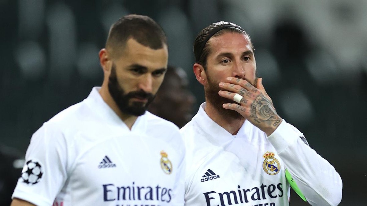 Ramos dan Benzema .mengejarkan kga (Foto: Getty Images/Lars Baron),