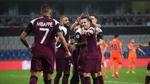 PSG's players celebrate their opening goal during the Champions League group H soccer match between Basaksehir and Paris Saint Germain in Istanbul, Wednesday, Oct. 28, 2020. (Tolga Bozoglu/Pool via AP)