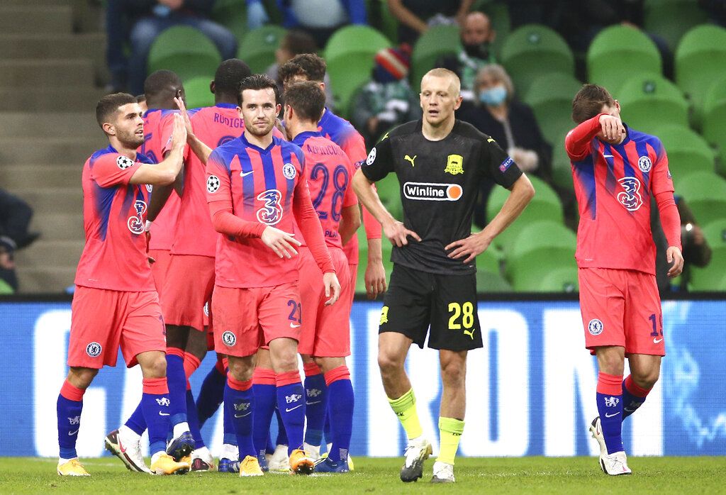 Chelsea's Timo Werner celebrates with teammates after scoring his side's second goal during the Champions League Group E soccer match between Krasnodar and Chelsea in Krasnodar, Russia, Wednesday, Oct. 28, 2020. (AP Photo)