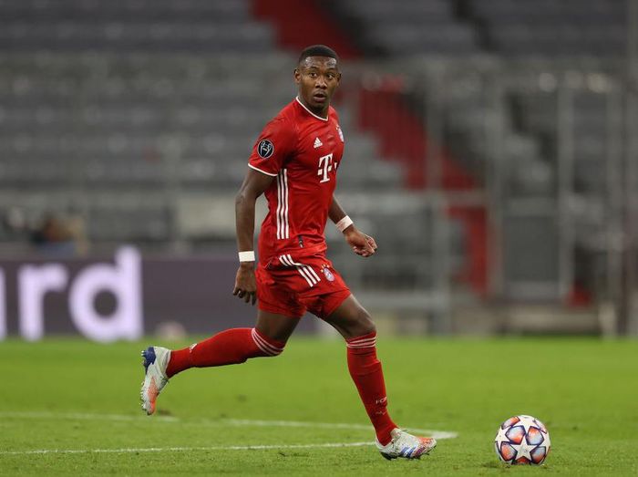 Hansi Flick MUNICH, GERMANY - OCTOBER 21: David Alaba of FC Bayern München runs with the ball during the UEFA Champions League Group A stage match between FC Bayern Muenchen and Atletico Madrid at Allianz Arena on October 21, 2020 in Munich, Germany. (Photo by Alexander Hassenstein/Getty Images)