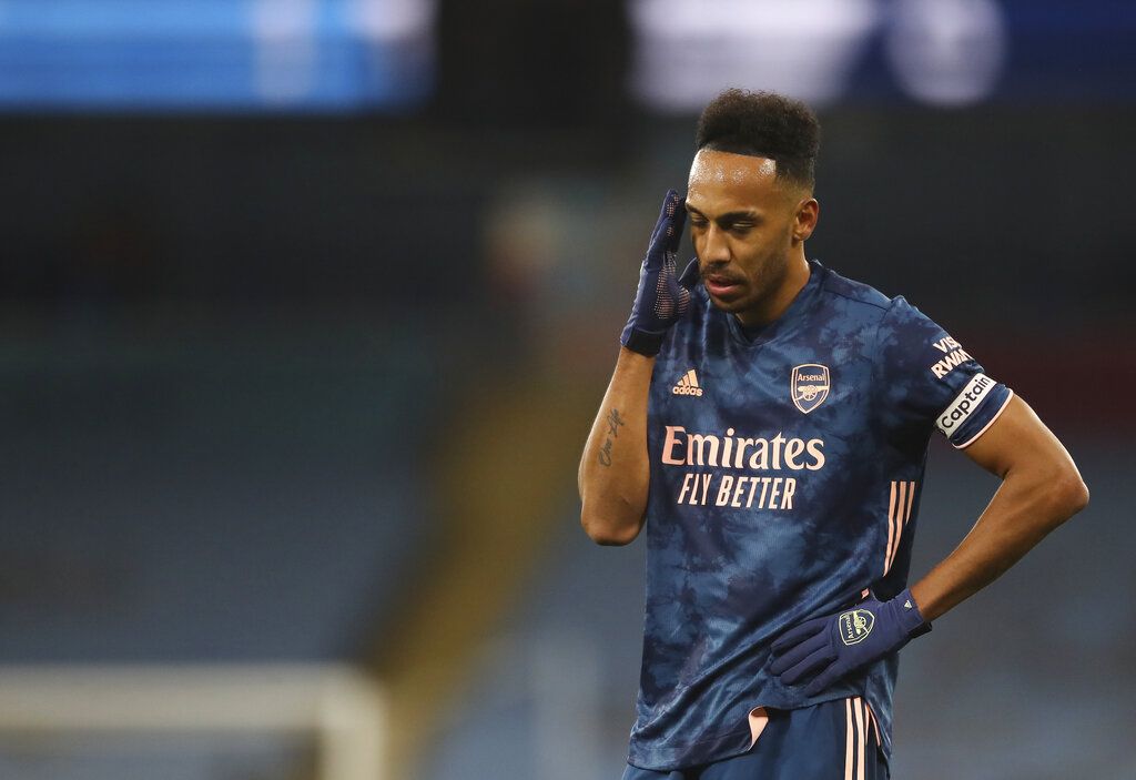 Arsenal's Pierre-Emerick Aubameyang reacts during the English Premier League soccer match between Manchester City and Arsenal at the Etihad stadium in Manchester, England, Saturday, Oct. 17, 2020. (Martin Rickett/Pool via AP)