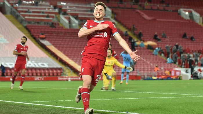 Diogo Jota Liverpool LIVERPOOL, ENGLAND - OCTOBER 31: Diogo Jota of Liverpool celebrates after he scores his teams second goal during the Premier League match between Liverpool and West Ham United at Anfield on October 31, 2020 in Liverpool, England. Sporting stadiums around the UK remain under strict restrictions due to the Coronavirus Pandemic as Government social distancing laws prohibit fans inside venues resulting in games being played behind closed doors. (Photo by Peter Powell - Pool/Getty Images)