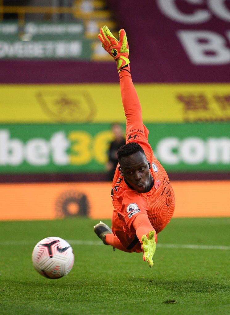 BURNLEY, ENGLAND - OCTOBER 31: Edouard Mendy of Chelsea during the Premier League match between Burnley and Chelsea at Turf Moor on October 31, 2020 in Burnley, England.  Sports stadiums across the UK remain under strict restrictions due to the coronavirus pandemic, as government social distancing laws prohibit fans within venues, causing games to be played behind closed doors.  (Photo by Alex Livesey / Getty Images)