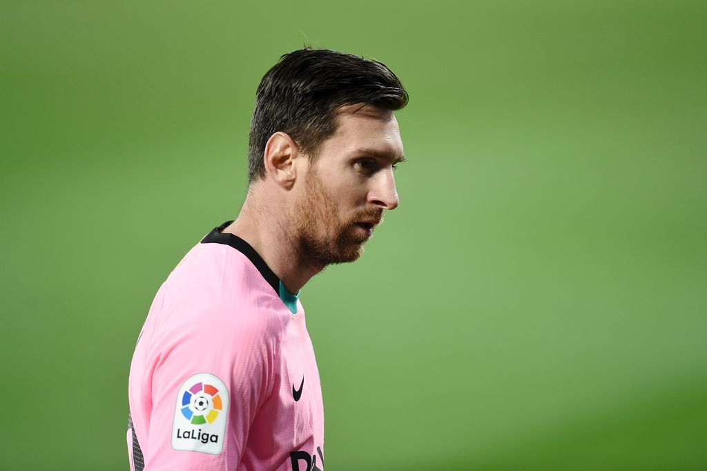 VITORIA-GASTEIZ, SPAIN - OCTOBER 31: Lionel Messi of Barcelona looks on during the La Liga Santander match between Deportivo Alavés and FC Barcelona at Estadio de Mendizorroza on October 31, 2020 in Vitoria-Gasteiz, Spain. Sporting stadiums around Spain remain under strict restrictions due to the Coronavirus Pandemic as Government social distancing laws prohibit fans inside venues resulting in games being played behind closed doors. (Photo by Juan Manuel Serrano Arce/Getty Images)