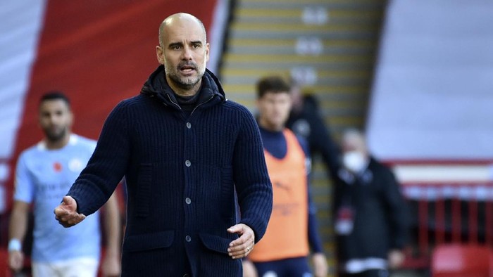 Manchester Citys head coach Pep Guardiola reacts during the English Premier League soccer match between Sheffield United and Manchester City at Bramall Lane stadium in Sheffield, England, Saturday, Oct. 31, 2020. (AP Photo/Rui Vieira, Pool)