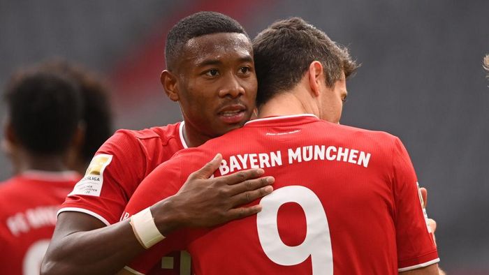 David Alaba MUNICH, GERMANY - OCTOBER 24: David Alaba (L) and Bayerns Robert Lewandowski celebrate during the German Bundesliga soccer match between FC Bayern Munich and Eintracht Frankfurt, in Munich, Germany, 24 October 2020.