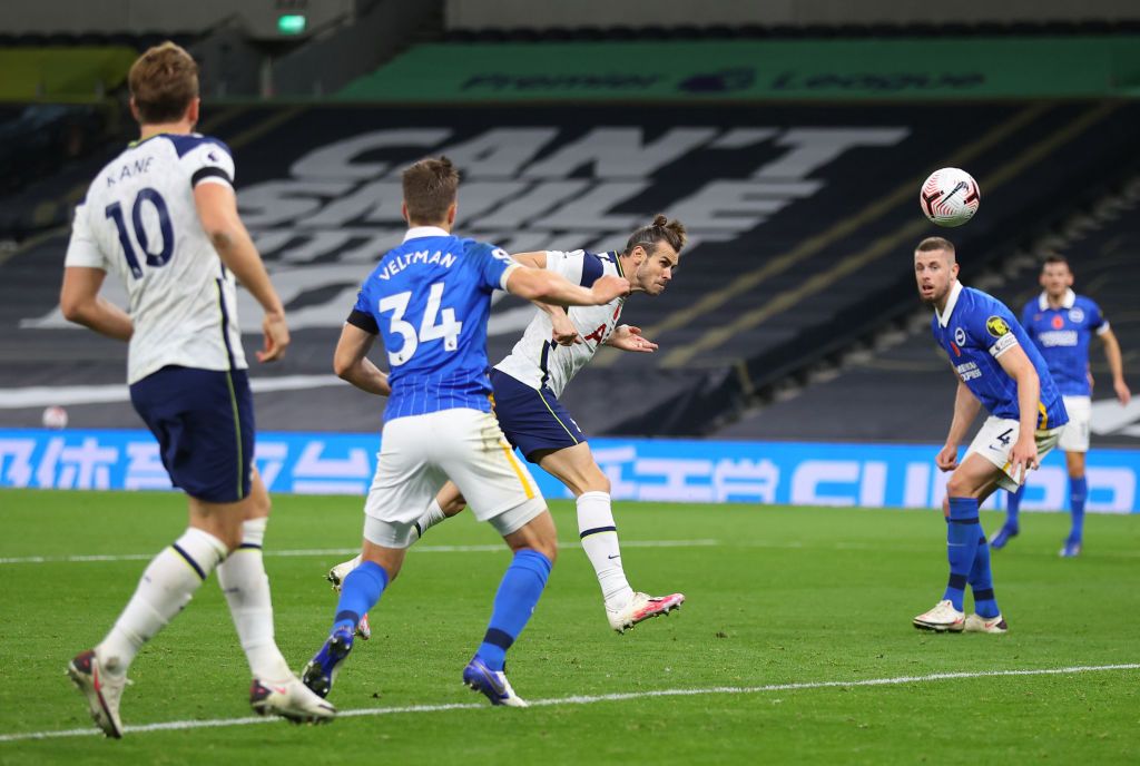 LONDON, ENGLAND - NOVEMBER 01: Gareth Bale of Tottenham Hotspur scores his sides second goal during the Premier League match between Tottenham Hotspur and Brighton & Hove Albion at Tottenham Hotspur Stadium on November 01, 2020 in London, England. Sporting stadiums around the UK remain under strict restrictions due to the Coronavirus Pandemic as Government social distancing laws prohibit fans inside venues resulting in games being played behind closed doors. (Photo by Julian Finney/Getty Images)