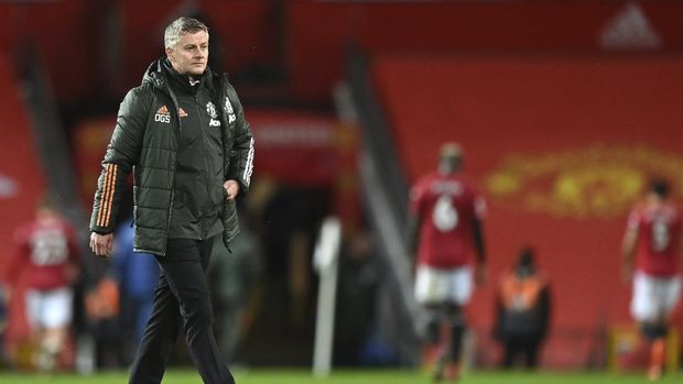 Manchester United's manager Ole Gunnar Solskjaer leaves the field end of the English Premier League soccer match between Manchester United and Arsenal at the Old Trafford stadium in Manchester, England, Sunday, Nov. 1, 2020. (Shaun Botterill/Pool via AP)