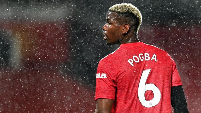 Pogba MANCHESTER, ENGLAND - OCTOBER 24: Paul Pogba of Manchester United looks on during the Premier League match between Manchester United and Chelsea at Old Trafford on October 24, 2020 in Manchester, England. Sporting stadiums around the UK remain under strict restrictions due to the Coronavirus Pandemic as Government social distancing laws prohibit fans inside venues resulting in games being played behind closed doors. (Photo by Michael Regan/Getty Images)