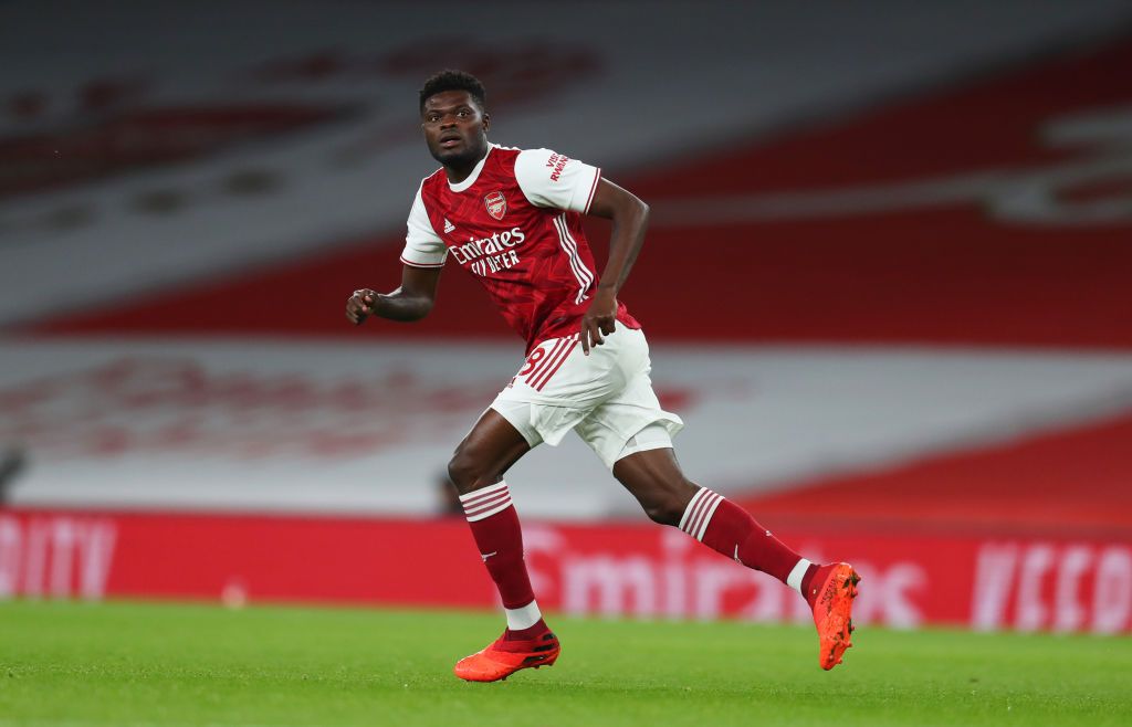 MANCHESTER, ENGLAND - NOVEMBER 01: Thomas Partey of Arsenal is put under pressure by Paul Pogba of Manchester United during the Premier League match between Manchester United and Arsenal at Old Trafford on November 01, 2020 in Manchester, England. Sporting stadiums around the UK remain under strict restrictions due to the Coronavirus Pandemic as Government social distancing laws prohibit fans inside venues resulting in games being played behind closed doors. (Photo by Shaun Botterill/Getty Images)