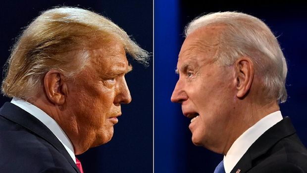 (COMBO) This combination of pictures created on October 22, 2020 shows US President Donald Trump (L) and Democratic Presidential candidate and former US Vice President Joe Biden during the final presidential debate at Belmont University in Nashville, Tennessee, on October 22, 2020. (Photos by Morry GASH and JIM WATSON / AFP)