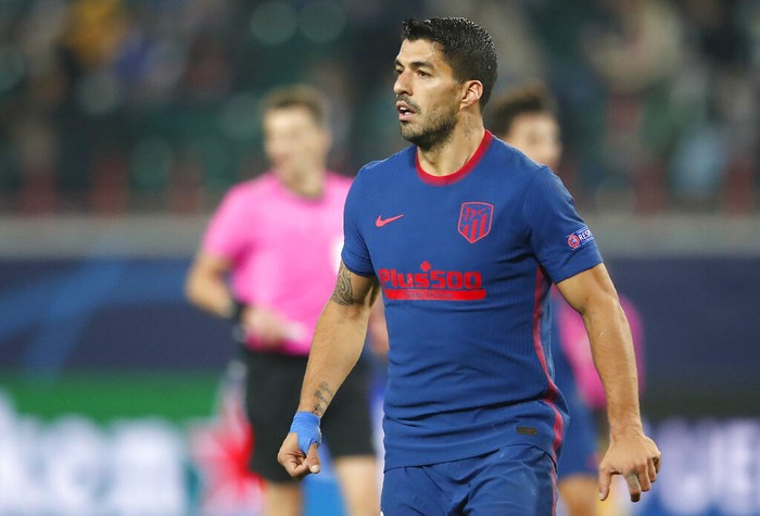 Atletico Madrids Luis Suarez during the Champions League Group A soccer match between Lokomotiv Moscow and Atletico Madrid in Moscow, Russia, Tuesday, Nov. 3, 2020. (Maxim Shemetov/Pool via AP)