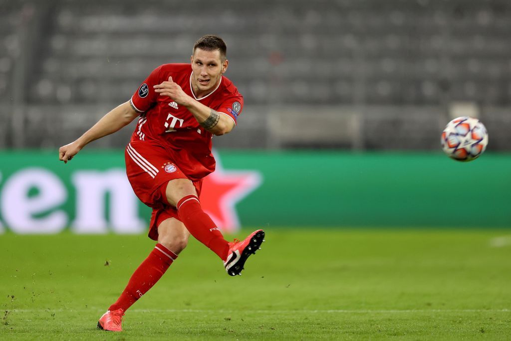 MUNICH, GERMANY - OCTOBER 21: Niklas Süle of FC Bayern München runs with the ball during the UEFA Champions League Group A stage match between FC Bayern Muenchen and Atletico Madrid at Allianz Arena on October 21, 2020 in Munich, Germany. (Photo by Alexander Hassenstein/Getty Images)