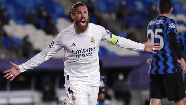 Real Madrid's Sergio Ramos celebrates after scoring his side's second goal during the Champions League group B soccer match between Real Madrid and Inter Milan at the Alfredo Di Stefano stadium in Madrid, Spain, Tuesday, Nov. 3, 2020. (AP Photo/Bernat Armangue)