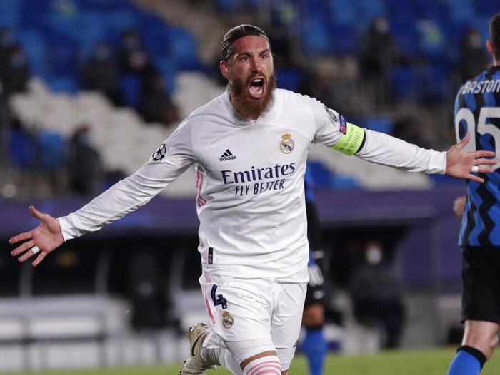 Real Madrid's Sergio Ramos celebrates after scoring his side's second goal during the Champions League group B soccer match between Real Madrid and Inter Milan at the Alfredo Di Stefano stadium in Madrid, Spain, Tuesday, Nov. 3, 2020. (AP Photo/Bernat Armangue)