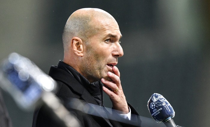 Real Madrids head coach Zinedine Zidane gives an interview after the Champions League group B soccer match between Borussia Moenchengladbach and Real Madrid at the Borussia Park in Moenchengladbach, Germany, Tuesday, Oct. 27, 2020. (AP Photo/Martin Meissner)