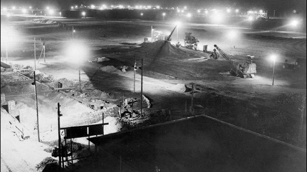 (FILES) This file photo taken on November 11, 1948 shows a general view of construction works at the Berlin Tegel airport in the french zone, ordered by the French Military authority for the Berlin airlift during the blockade. - Drab and outdated but beloved for its convenience and quirky hexagonal design, Berlin's Tegel airport will finally close for good on Sunday, November 8, 2020, after more than 60 years. (Photo by - / AFP)