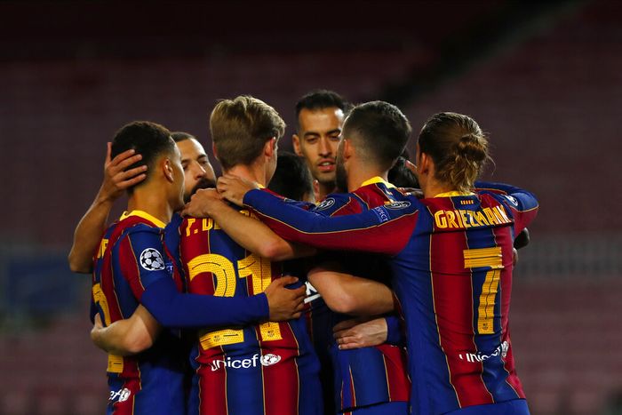 Barcelona Barcelonas Lionel Messi celebrates with teammates after scoring from a penalty kick during the Champions League group G soccer match between FC Barcelona and Dynamo Kyiv at the Camp Nou stadium in Barcelona, Spain, Wednesday, Nov. 4, 2020. (AP Photo/Joan Monfort)