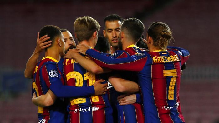 Barcelona Barcelonas Lionel Messi celebrates with teammates after scoring from a penalty kick during the Champions League group G soccer match between FC Barcelona and Dynamo Kyiv at the Camp Nou stadium in Barcelona, Spain, Wednesday, Nov. 4, 2020. (AP Photo/Joan Monfort)
