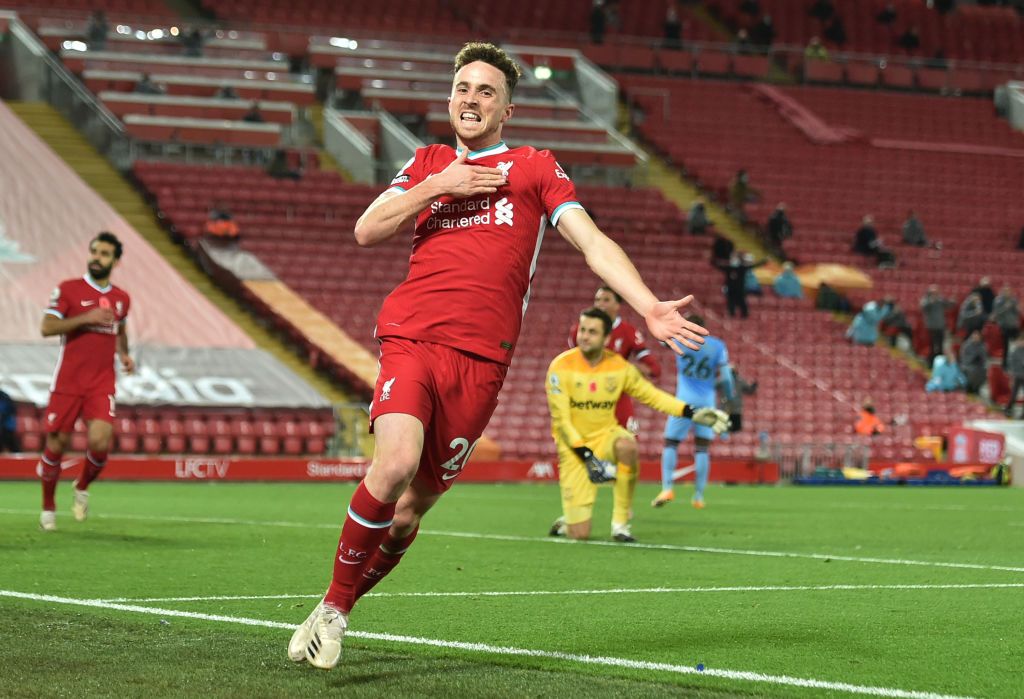 LIVERPOOL, ENGLAND - OCTOBER 31: Diogo Jota of Liverpool  celebrates after he scores his team's second goal  during the Premier League match between Liverpool and West Ham United at Anfield on October 31, 2020 in Liverpool, England. Sporting stadiums around the UK remain under strict restrictions due to the Coronavirus Pandemic as Government social distancing laws prohibit fans inside venues resulting in games being played behind closed doors. (Photo by Peter Powell - Pool/Getty Images)
