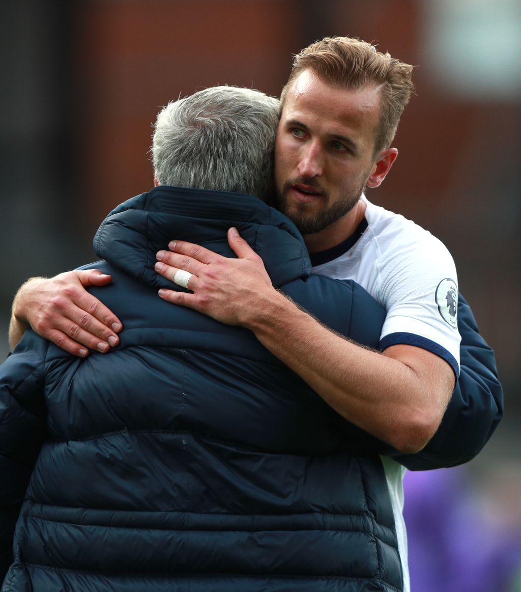LONDON, ENGLAND - JULY 26: Harry Kane of Tottenham Hotspur embraces Jose Mourinho, Manager of Tottenham Hotspur after the Premier League match between Crystal Palace and Tottenham Hotspur at Selhurst Park on July 26, 2020 in London, England.Football Stadiums around Europe remain empty due to the Coronavirus Pandemic as Government social distancing laws prohibit fans inside venues resulting in all fixtures being played behind closed doors. (Photo by Ian Walton/Pool via Getty Images)