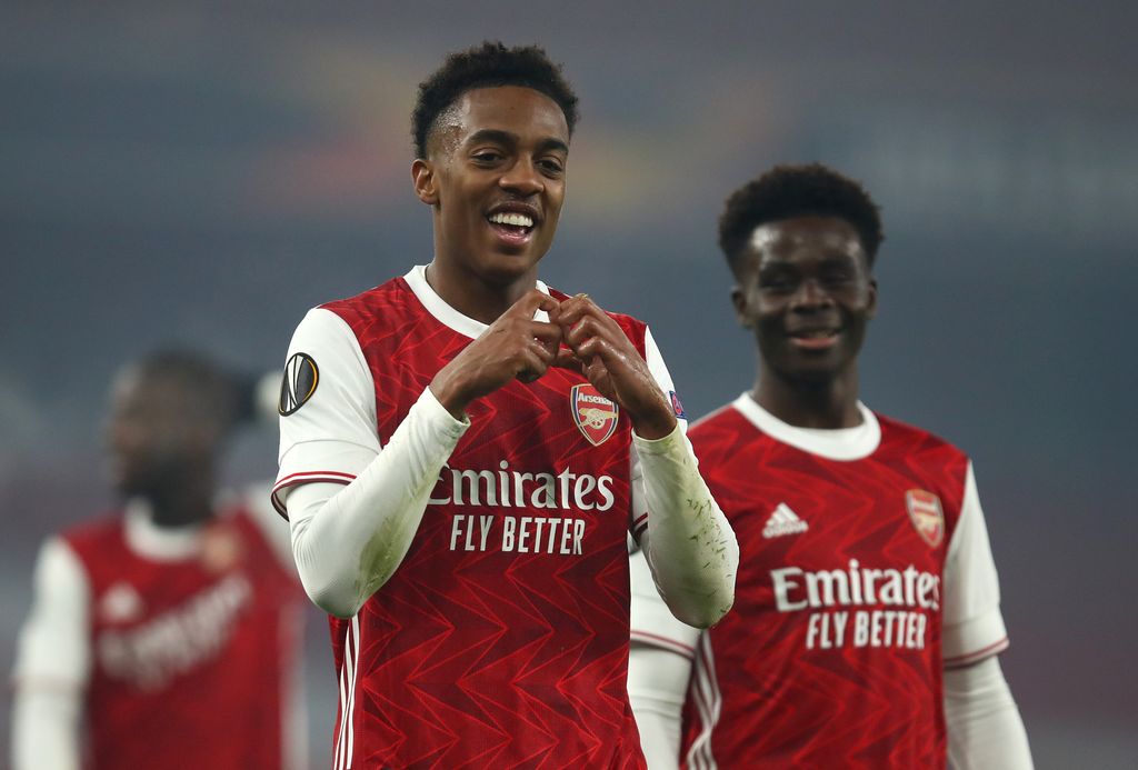 LONDON, ENGLAND - NOVEMBER 05: Joe Willock of Arsenal  celebrates after he scores his team's fourth goal  during the UEFA Europa League Group B stage match between Arsenal FC and Molde FK at Emirates Stadium on November 05, 2020 in London, England. Sporting stadiums around the UK remain under strict restrictions due to the Coronavirus Pandemic as Government social distancing laws prohibit fans inside venues resulting in games being played behind closed doors. (Photo by Julian Finney/Getty Images)
