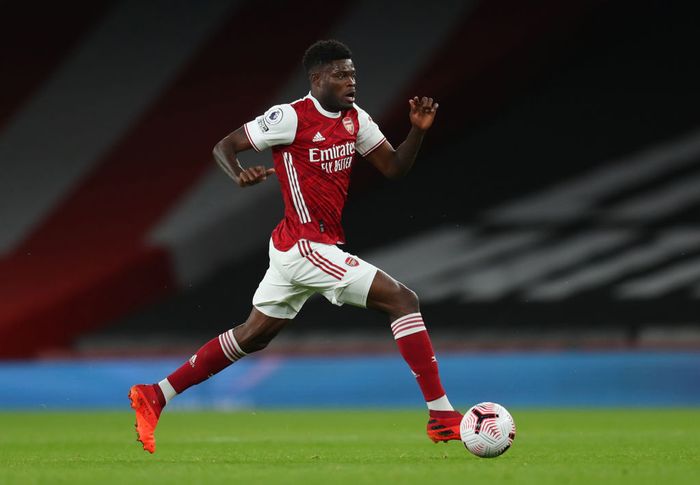Thomas Partey LONDON, ENGLAND - OCTOBER 25: Thomas Partey of Arsenal during the Premier League match between Arsenal and Leicester City at Emirates Stadium on October 25, 2020 in London, England. Sporting stadiums around the UK remain under strict restrictions due to the Coronavirus Pandemic as Government social distancing laws prohibit fans inside venues resulting in games being played behind closed doors. (Photo by Catherine Ivill/Getty Images)