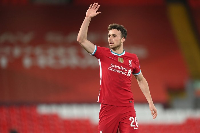 LIVERPOOL, ENGLAND - OCTOBER 27: Diogo Jota of Liverpool in action during the UEFA Champions League Group D stage match between Liverpool FC and FC Midtjylland at Anfield on October 27, 2020 in Liverpool, England. Sporting stadiums around the UK remain under strict restrictions due to the Coronavirus Pandemic as Government social distancing laws prohibit fans inside venues resulting in games being played behind closed doors. (Photo by Michael Regan/Getty Images)