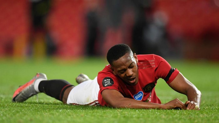 Anthony Martial MANCHESTER, ENGLAND - JULY 13: Anthony Martial of Manchester United reacts during the Premier League match between Manchester United and Southampton FC at Old Trafford on July 13, 2020 in Manchester, England. Football Stadiums around Europe remain empty due to the Coronavirus Pandemic as Government social distancing laws prohibit fans inside venues resulting in all fixtures being played behind closed doors. (Photo by Peter Powell/Pool via Getty Images)