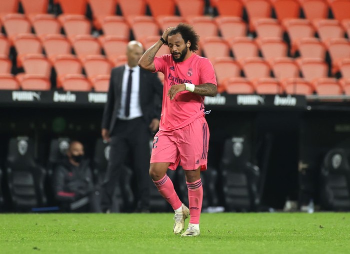 VALENCIA, SPAIN - NOVEMBER 08: Marcelo of Real Madrid looks dejected during the La Liga Santander match between Valencia CF and Real Madrid at Estadio Mestalla on November 08, 2020 in Valencia, Spain. Sporting stadiums around Spain remain under strict restrictions due to the Coronavirus Pandemic as Government social distancing laws prohibit fans inside venues resulting in games being played behind closed doors. (Photo by Angel Martinez/Getty Images)