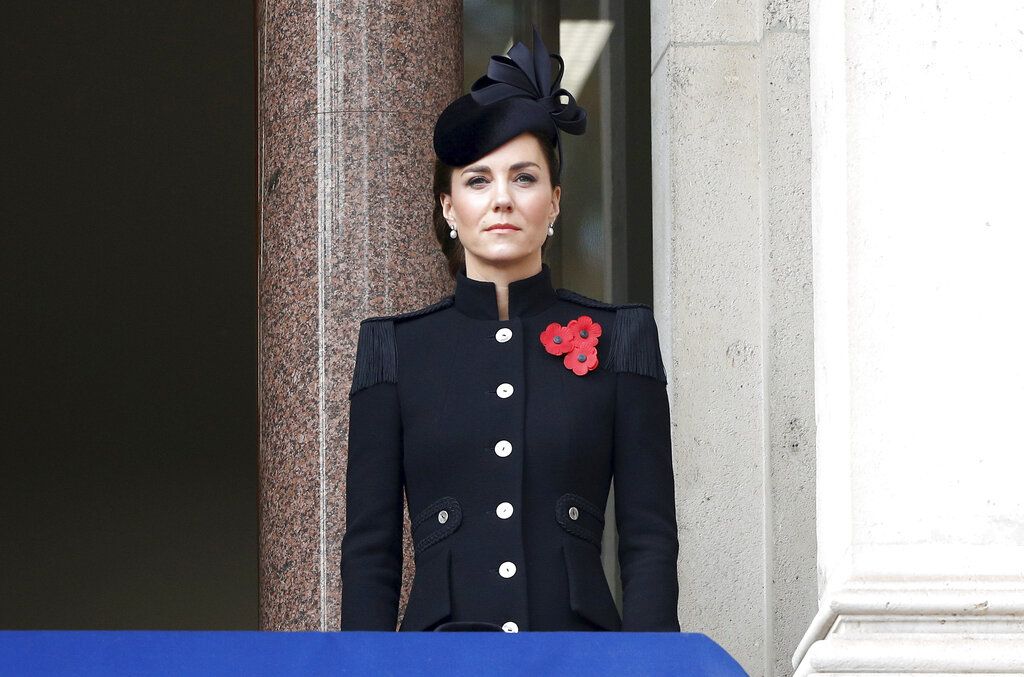 Britain's Kate, the Duchess of Cambridge stands on the balcony of the Foreign Office, during the Remembrance Sunday service at the Cenotaph, in Whitehall, London, Sunday Nov. 8, 2020. (Peter Nicholls/Pool Photo via AP)