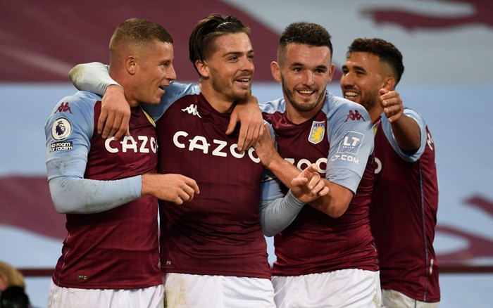 BIRMINGHAM, ENGLAND - OCTOBER 04: Jack Grealish of Aston Villa celebrates after scoring his teams sixth goal during the Premier League match between Aston Villa and Liverpool at Villa Park on October 04, 2020 in Birmingham, England. Sporting stadiums around the UK remain under strict restrictions due to the Coronavirus Pandemic as Government social distancing laws prohibit fans inside venues resulting in games being played behind closed doors. (Photo by Peter Powell - Pool/Getty Images)