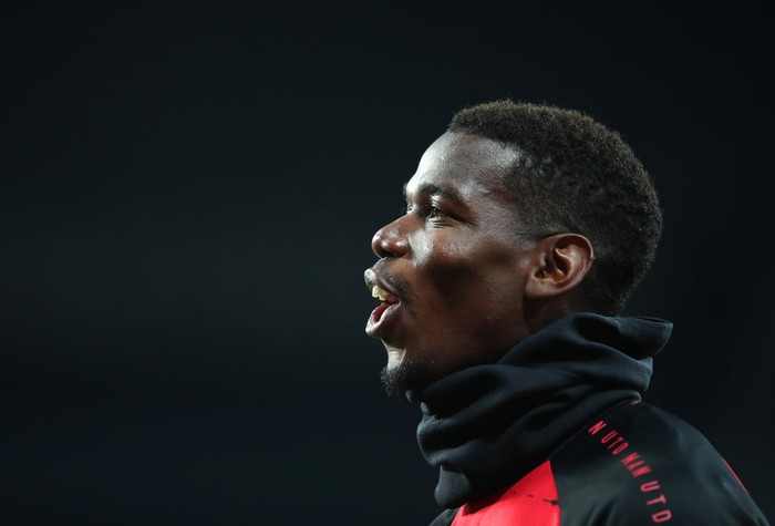 NEWCASTLE UPON TYNE, ENGLAND - OCTOBER 17: Paul Pogba of Manchester United warms up prior to the Premier League match between Newcastle United and Manchester United at St. James Park on October 17, 2020 in Newcastle upon Tyne, England. Sporting stadiums around the UK remain under strict restrictions due to the Coronavirus Pandemic as Government social distancing laws prohibit fans inside venues resulting in games being played behind closed doors. (Photo by Alex Pantling/Getty Images)