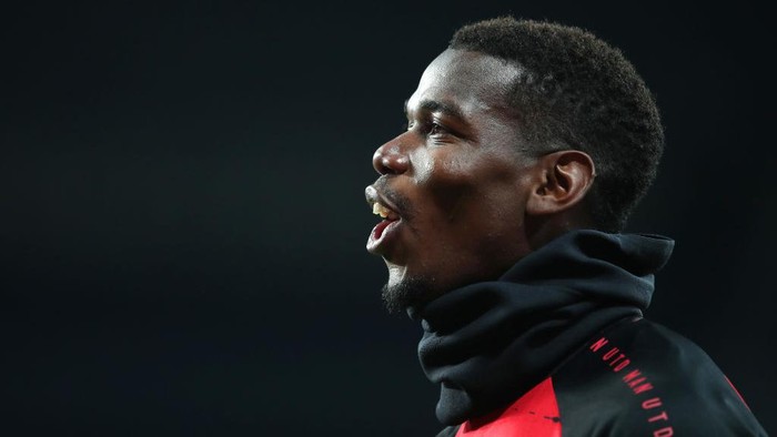 NEWCASTLE UPON TYNE, ENGLAND - OCTOBER 17: Paul Pogba of Manchester United warms up prior to the Premier League match between Newcastle United and Manchester United at St. James Park on October 17, 2020 in Newcastle upon Tyne, England. Sporting stadiums around the UK remain under strict restrictions due to the Coronavirus Pandemic as Government social distancing laws prohibit fans inside venues resulting in games being played behind closed doors. (Photo by Alex Pantling/Getty Images)