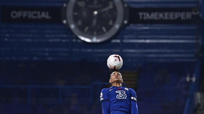 Chelseas Thiago Silva heads the ball during the English Premier League soccer match between Chelsea and Sheffield United at Stamford Bridge Stadium in London, Saturday, Nov. 7, 2020. (Ben Stansall/Pool via AP)