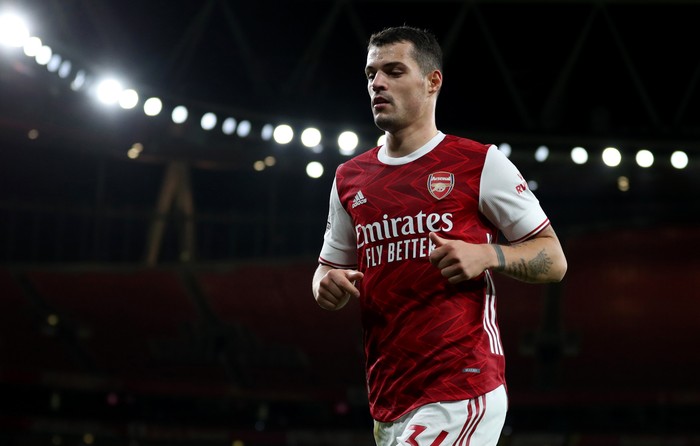 LONDON, ENGLAND - OCTOBER 25: Granit Xhaka of Arsenal  during the Premier League match between Arsenal and Leicester City at Emirates Stadium on October 25, 2020 in London, England. Sporting stadiums around the UK remain under strict restrictions due to the Coronavirus Pandemic as Government social distancing laws prohibit fans inside venues resulting in games being played behind closed doors. (Photo by Catherine Ivill/Getty Images)