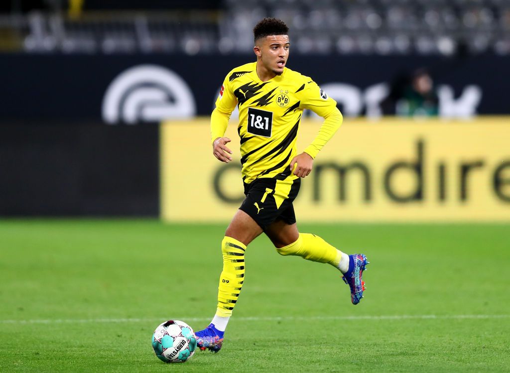 DORTMUND, GERMANY - OCTOBER 24: Jadon Sancho of Dortmund runs with the ball during the Bundesliga match between Borussia Dortmund and FC Schalke 04 at Signal Iduna Park on October 24, 2020 in Dortmund, Germany. A limited number of spectators (300) will be in attendance as Covid-19 pandemic restrictions are eased in Dortmund.  (Photo by Martin Rose/Getty Images)