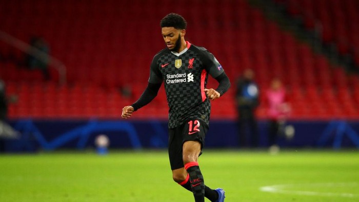 AMSTERDAM, NETHERLANDS - OCTOBER 21: Joe Gomez of Liverpool in action during the UEFA Champions League Group D stage match between Ajax Amsterdam and Liverpool FC at Johan Cruijff Arena on October 21, 2020 in Amsterdam, Netherlands. (Photo by Dean Mouhtaropoulos/Getty Images)