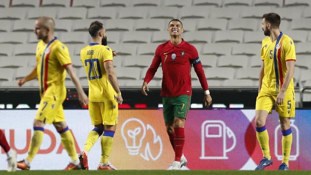 Portugal's Cristiano Ronaldo, centre, reacts during the international friendly soccer match between Portugal and Andorra at the Luz stadium in Lisbon, Portugal, Wednesday, Nov. 11, 2020. (AP Photo/Armando Franca)