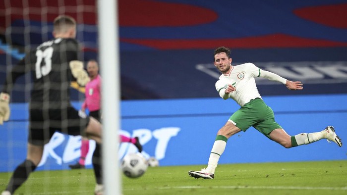 Irelands Alan Browne has his shot saved by Englands goalkeeper Dean Henderson during the international friendly soccer match between England and Ireland at Wembley stadium in London, England, Thursday Nov. 12, 2020. (Nick Potts/Pool via AP)