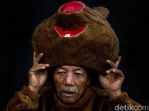 Si Penebar Senyum di Tengah Macet Ibu Kota