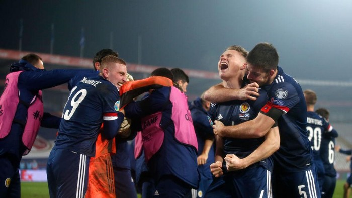 BELGRADE, SERBIA - NOVEMBER 12: Scott McTominay of Scotland and Declan Gallagher of Scotland celebrate after the UEFA EURO 2020 Play-Off Final between Serbia and Scotland at Rajko Mitic Stadium on November 12, 2020 in Belgrade, Serbia. Football Stadiums around Europe remain empty due to the Coronavirus Pandemic as Government social distancing laws prohibit fans inside venues resulting in fixtures being played behind closed doors. (Photo by Srdjan Stevanovic/Getty Images)